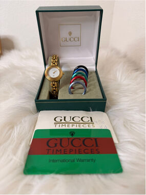 Gucci Interchangeable Bezel Rice Link Watch, w/ 6 metal bezels, box & paperwork